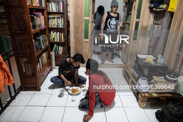 Students having lunch after praying. Islamic boarding school for punk and street children in Ruko Cimanggis, Ciputat, South Tangerang, Bante...