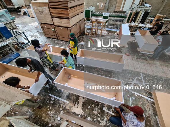 Coffin for Covid19 victim in Indonesia produced by Hakari Furniture at Tangerang, Banten, Indonesia, on February 2, 2021. The company produc...