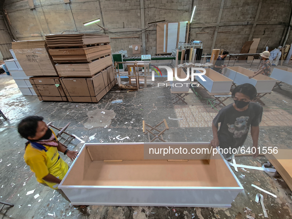 Coffin for Covid19 victim in Indonesia produced by Hakari Furniture at Tangerang, Banten, Indonesia, on February 2, 2021. The company produc...