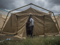 Temporary tent city for migrants set up by the Italian Red Cross next to the Tiburtina train station in Rome on June 15, 2015. Hundreds of m...