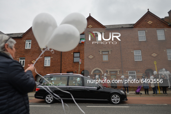 Residents of New Street in Dublin hold white balloons to say goodbye to their recently departed neighbour, Mrs. Quinn (age 89).
Since the be...