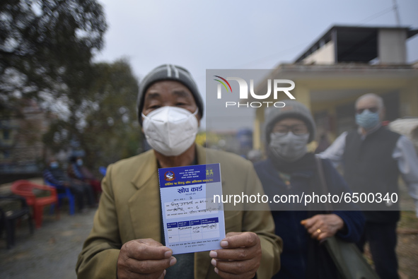 Nepalese People above 65 shows vaccination card after getting first dose of COVID19 vaccines developed by Oxford- AstraZeneca Plc at Bal Kum...