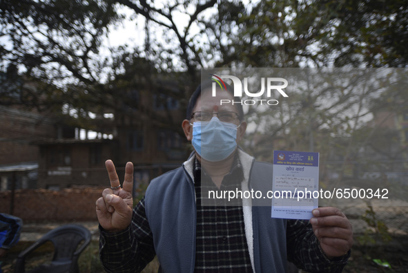 Nepalese People above 65 shows vaccination card after getting first dose of COVID19 vaccines developed by Oxford- AstraZeneca Plc at Bal Kum...