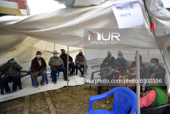 Nepalese People above 65 take rest after getting first dose of COVID19 vaccines developed by Oxford- AstraZeneca Plc at Bal Kumari Health Po...