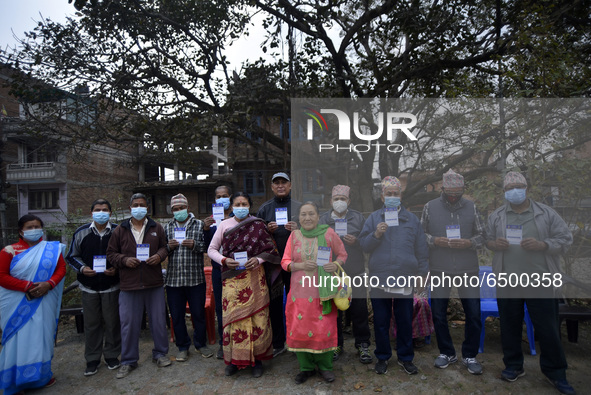 Nepalese People above 65 shows vaccination card after getting first dose of COVID19 vaccines developed by Oxford- AstraZeneca Plc at Bal Kum...