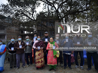 Nepalese People above 65 shows vaccination card after getting first dose of COVID19 vaccines developed by Oxford- AstraZeneca Plc at Bal Kum...