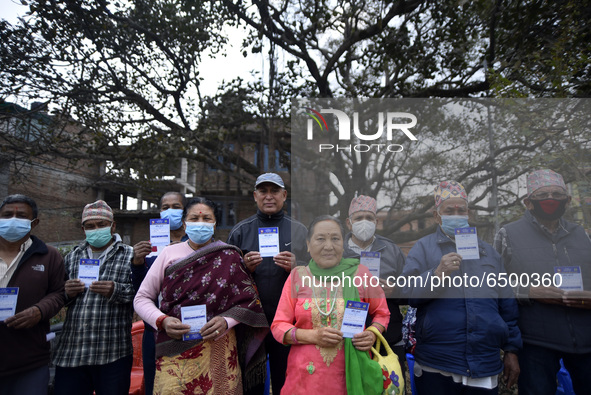 Nepalese People above 65 shows vaccination card after getting first dose of COVID19 vaccines developed by Oxford- AstraZeneca Plc at Bal Kum...