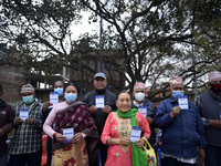 Nepalese People above 65 shows vaccination card after getting first dose of COVID19 vaccines developed by Oxford- AstraZeneca Plc at Bal Kum...