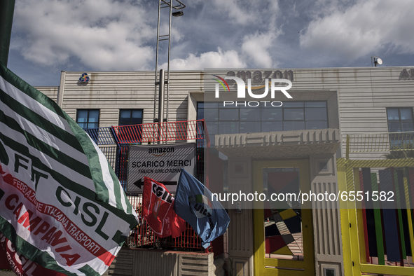 Members of the CISL, CGIL, UIL trade unions and some non-parliamentary party members gather outside the Amazon plant in Arzano in Naples, It...