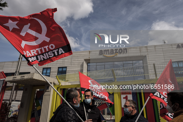 Members of the CISL, CGIL, UIL trade unions and some non-parliamentary party members gather outside the Amazon plant in Arzano in Naples, It...