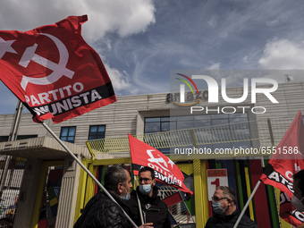 Members of the CISL, CGIL, UIL trade unions and some non-parliamentary party members gather outside the Amazon plant in Arzano in Naples, It...