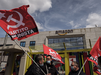 Members of the CISL, CGIL, UIL trade unions and some non-parliamentary party members gather outside the Amazon plant in Arzano in Naples, It...