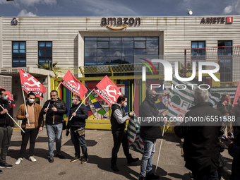 Members of the CISL, CGIL, UIL trade unions and some non-parliamentary party members gather outside the Amazon plant in Arzano in Naples, It...