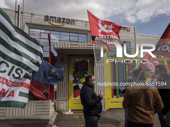 Members of the CISL, CGIL, UIL trade unions and some non-parliamentary party members gather outside the Amazon plant in Arzano in Naples, It...