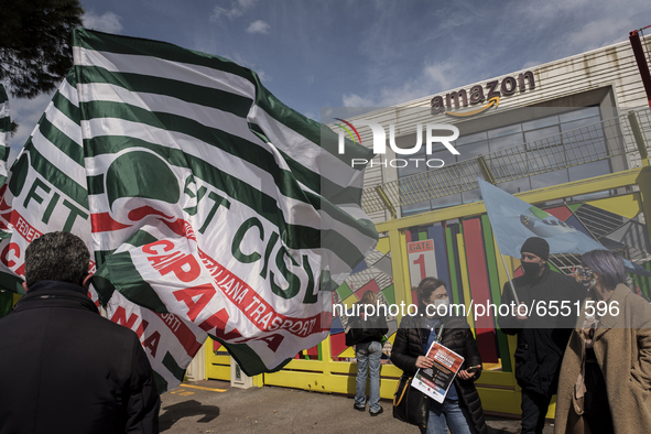 Members of the CISL, CGIL, UIL trade unions and some non-parliamentary party members gather outside the Amazon plant in Arzano in Naples, It...