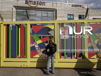 Members of the CISL, CGIL, UIL trade unions and some non-parliamentary party members gather outside the Amazon plant in Arzano in Naples, It...