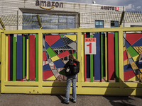 Members of the CISL, CGIL, UIL trade unions and some non-parliamentary party members gather outside the Amazon plant in Arzano in Naples, It...