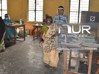 A  elderly women voters after casting ballot  in the first  phase of polling for Assam Assembly Elections, at  Rupohi   constituency in Naga...