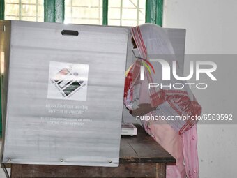 A  Women voters casting ballot  in the first  phase of polling for Assam Assembly Elections, at  Rupohi   constituency in Nagaon district, i...