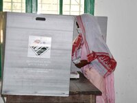 A  Women voters casting ballot  in the first  phase of polling for Assam Assembly Elections, at  Rupohi   constituency in Nagaon district, i...