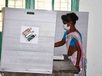 A  Women voters casting ballot  in the first  phase of polling for Assam Assembly Elections, at  Rupohi   constituency in Nagaon district, i...