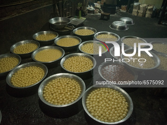 Sweets are kept in a traditional sweet production house in Bogura, Bangladesh. (