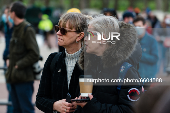 Mourners queue outside Buckingham Palace after it was announced that Britain's Prince Philip, husband of Queen Elizabeth, has died at the ag...