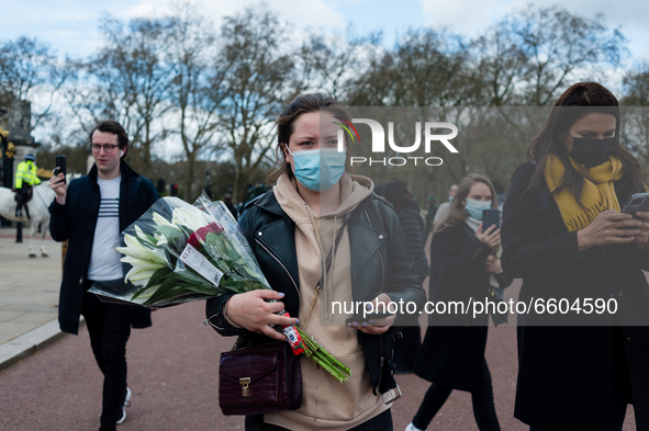 Mourners queue outside Buckingham Palace after it was announced that Britain's Prince Philip, husband of Queen Elizabeth, has died at the ag...