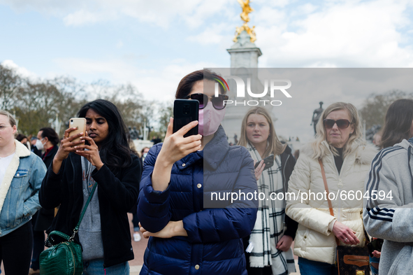 Mourners queue outside Buckingham Palace after it was announced that Britain's Prince Philip, husband of Queen Elizabeth, has died at the ag...