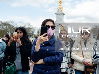 Mourners queue outside Buckingham Palace after it was announced that Britain's Prince Philip, husband of Queen Elizabeth, has died at the ag...