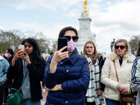 Mourners queue outside Buckingham Palace after it was announced that Britain's Prince Philip, husband of Queen Elizabeth, has died at the ag...