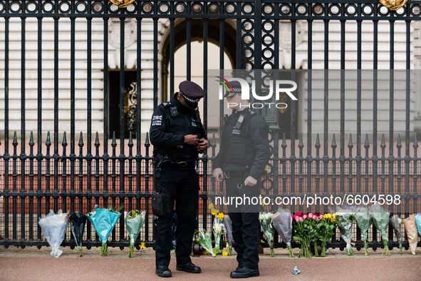 Police outside Buckingham Palace after it was announced that Britain's Prince Philip, husband of Queen Elizabeth, has died at the age of 99,...