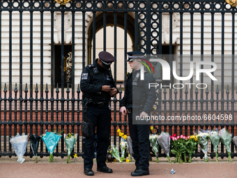 Police outside Buckingham Palace after it was announced that Britain's Prince Philip, husband of Queen Elizabeth, has died at the age of 99,...