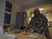 Ifrah Ahmed, a Somali-Irish living in Dublin, prepares her iftar (fast-breaking) dinner inside her apartment, on the second day of Ramadan,...