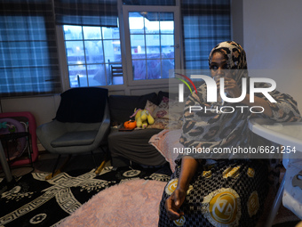 Ifrah Ahmed, a Somali-Irish living in Dublin, having a glass of water at the end of a fast inside her apartment, on the second day of Ramada...