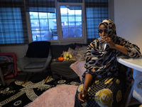 Ifrah Ahmed, a Somali-Irish living in Dublin, having a glass of water at the end of a fast inside her apartment, on the second day of Ramada...