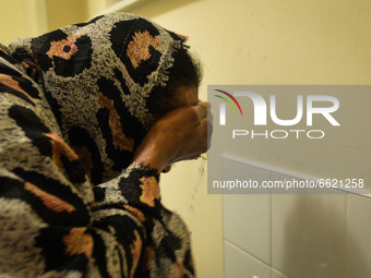 Ifrah Ahmed, a Somali-Irish living in Dublin, during Wudu ritual (the Islamic procedure that consists of washing the face, arms, then wiping...