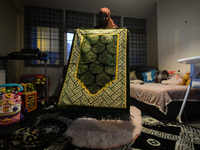 Ifrah Ahmed, a Somali-Irish living in Dublin, prepares a prayer mat for Maghrib, the fourth of the five required daily prayers, inside her a...