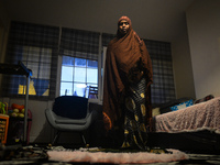 Ifrah Ahmed, a Somali-Irish living in Dublin, during Maghrib, the fourth of the five required daily prayers, inside her apartment on the sec...