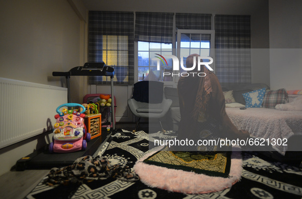 Ifrah Ahmed, a Somali-Irish living in Dublin, during Maghrib, the fourth of the five required daily prayers, inside her apartment on the sec...