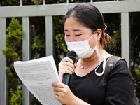 Lim Ji-young, an activist of ADI(Asian Dignity Initiative) shedds tears during solidarity remarks outside of Indonesian Embassy in Korea on...