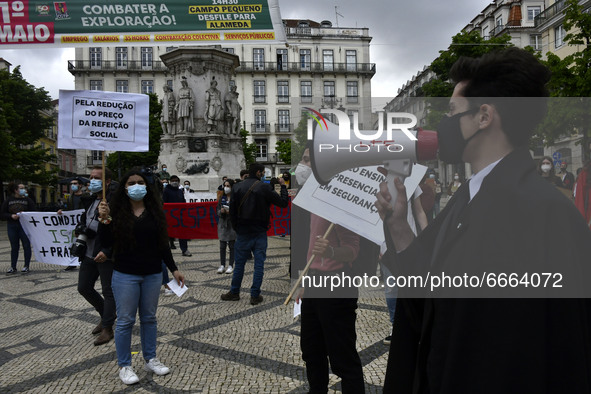 Students wearing protective masks march through the streets of Lisbon to demand their rights as students. April 28, 2021. Demonstrators from...