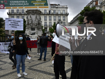 Students wearing protective masks march through the streets of Lisbon to demand their rights as students. April 28, 2021. Demonstrators from...