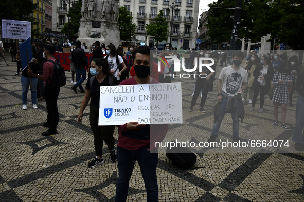 Students wearing protective masks march through the streets of Lisbon to demand their rights as students. April 28, 2021. Demonstrators from...