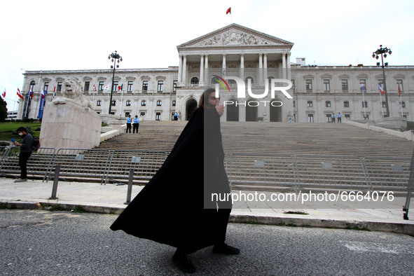 A student using a megaphone encourages the demonstrators in front of the Republic Assembly palace. April 28, 2021. Demonstrators from differ...