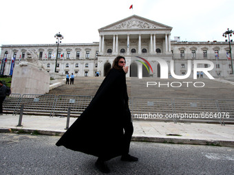 A student using a megaphone encourages the demonstrators in front of the Republic Assembly palace. April 28, 2021. Demonstrators from differ...