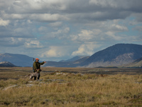 Father Krzysztof Sikora seen with his dog 'Rambo' near to the Gowla Fishery, situated in central Connemara, among one of the most beautiful...