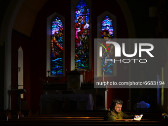 Father Krzysztof Sikora inside St James's Church, in Cashel, Connemara.

Geographically, Roundstone parish is considered Ireland's largest p...