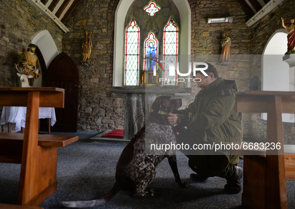 Father Krzysztof Sikora with his dog 'Rambo' seen inside Ballynahinch Church, in Emlaghdauroe, Connemara.
This former Church of Ireland chur...