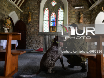 Father Krzysztof Sikora with his dog 'Rambo' seen inside Ballynahinch Church, in Emlaghdauroe, Connemara.
This former Church of Ireland chur...